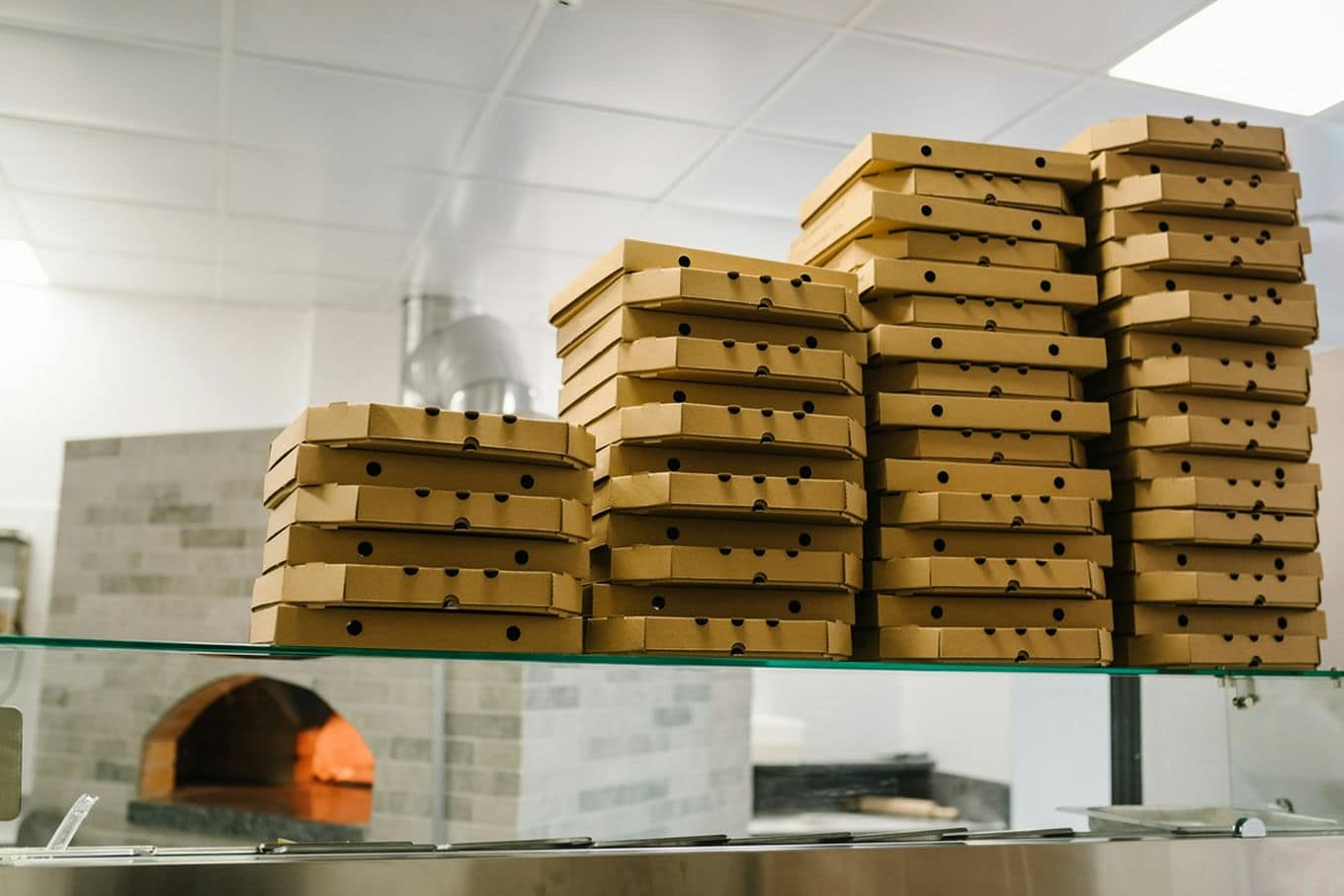 Jakie są najpopularniejsze rozmiary kartonowych opakowań na pizzę?